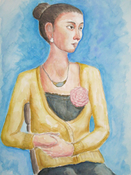 黄色いカーデガンの女性