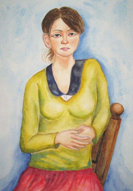 黄色いセーターの女性