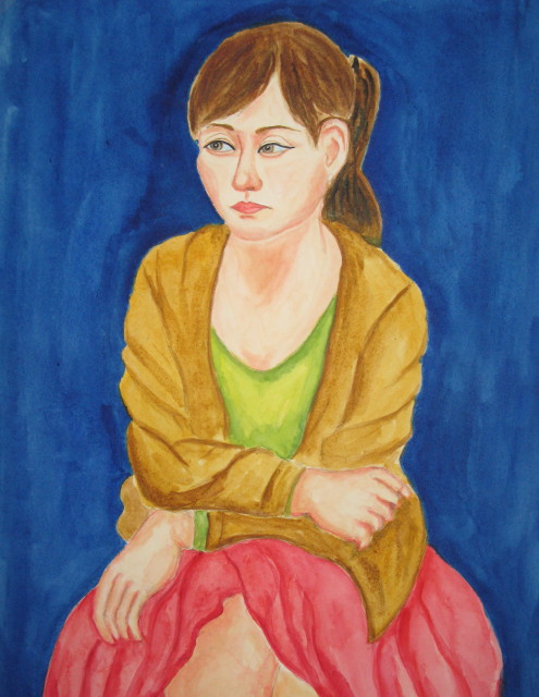 イエローカーデガンの女性