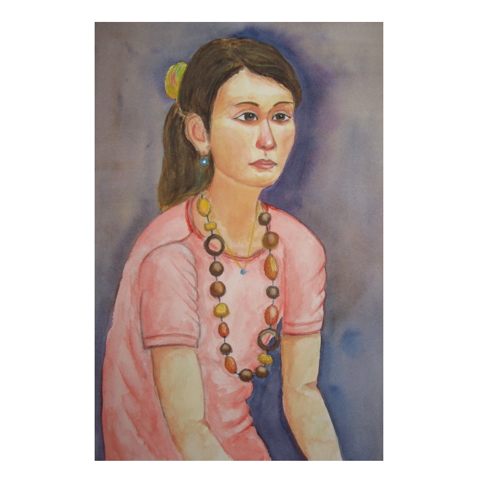 サーモンピンクTシャツの女性