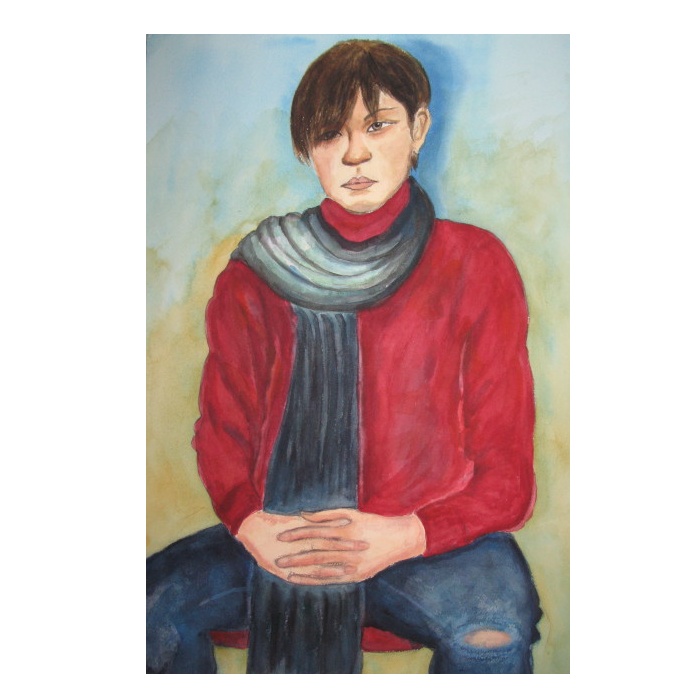 赤いハイネックセーターの青年